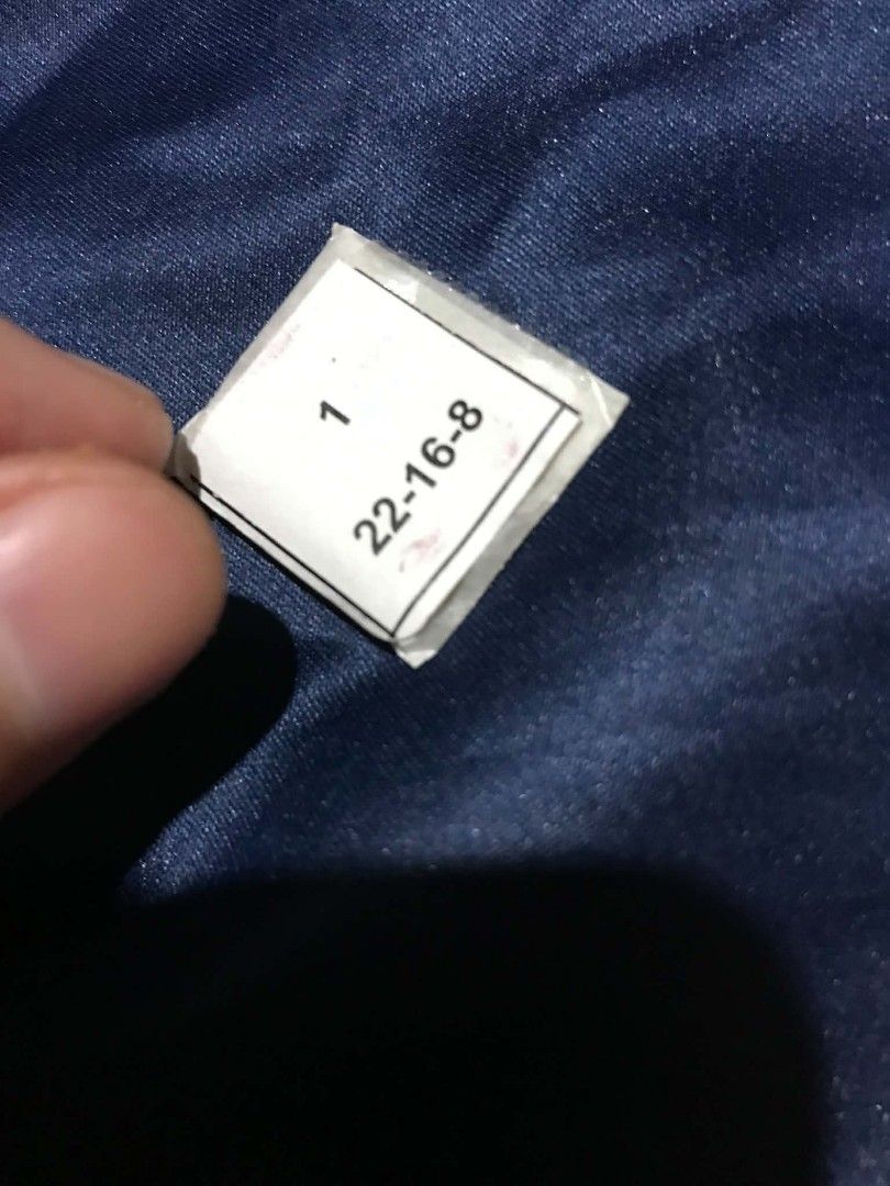 Small wrapped item with label 22-16-8 (Category: Men's Watches) located in Caloocan City. Submitted by richel21.751 (Listing ID 1469260522, Image 2). Description: - Condition: Brand new, unopened, and sealed in clear plastic Stainless Steel Buckle watch part for Rolex - Identifiers: Paper label on back with numbers 1 and 22-16-8 - Storage: Kept secure and well-maintained.