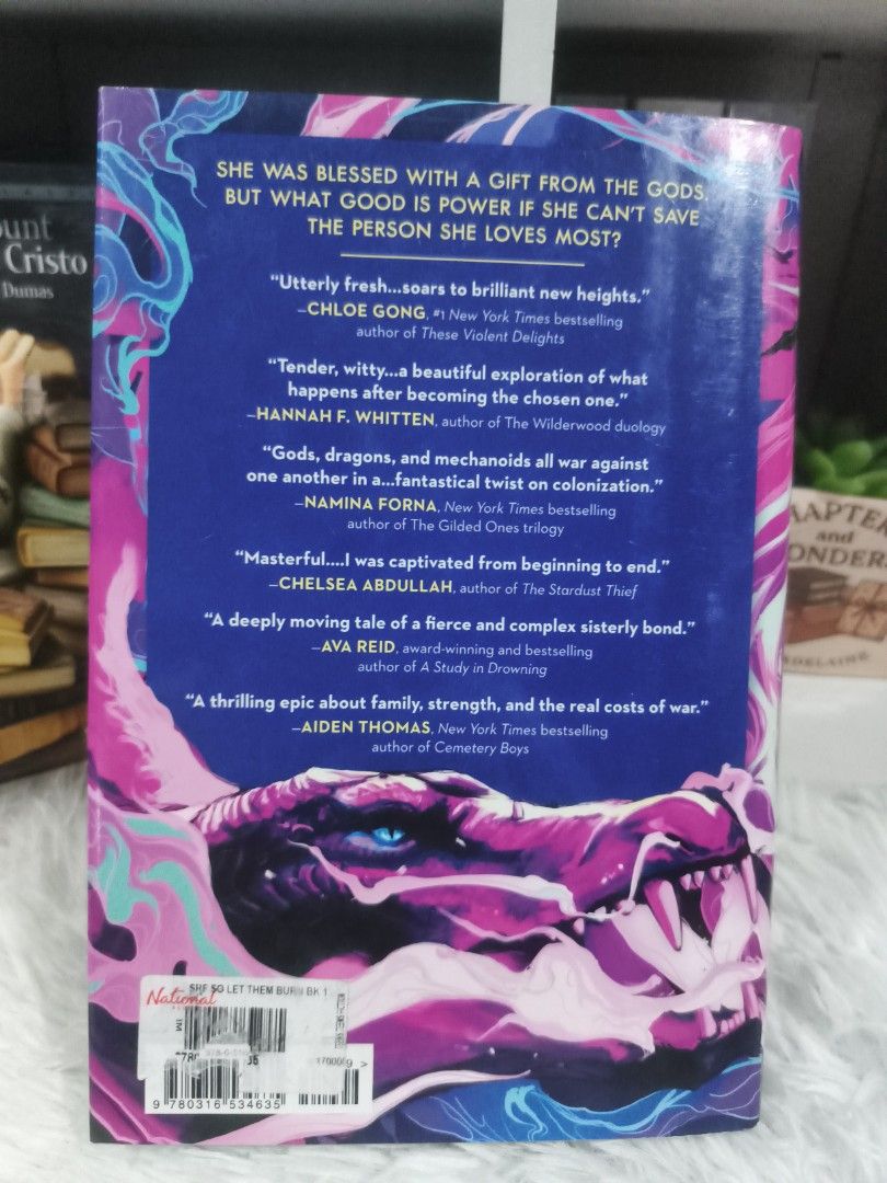 So Let Them Burn by Kamilah Cole (Category: Storybooks) located in Cabuyao City. Submitted by chaptersandwonders143 (Listing ID 1469314845, Image 2). Description: - Title: So Let Them Burn by Kamilah Cole - Genre: YA Fantasy (dragons, sisters, rebellion) - Format: Hardcover with ISBN on back - Condition: Clean pages, tight binding, minimal shelf wear - Status: Ready to ship.