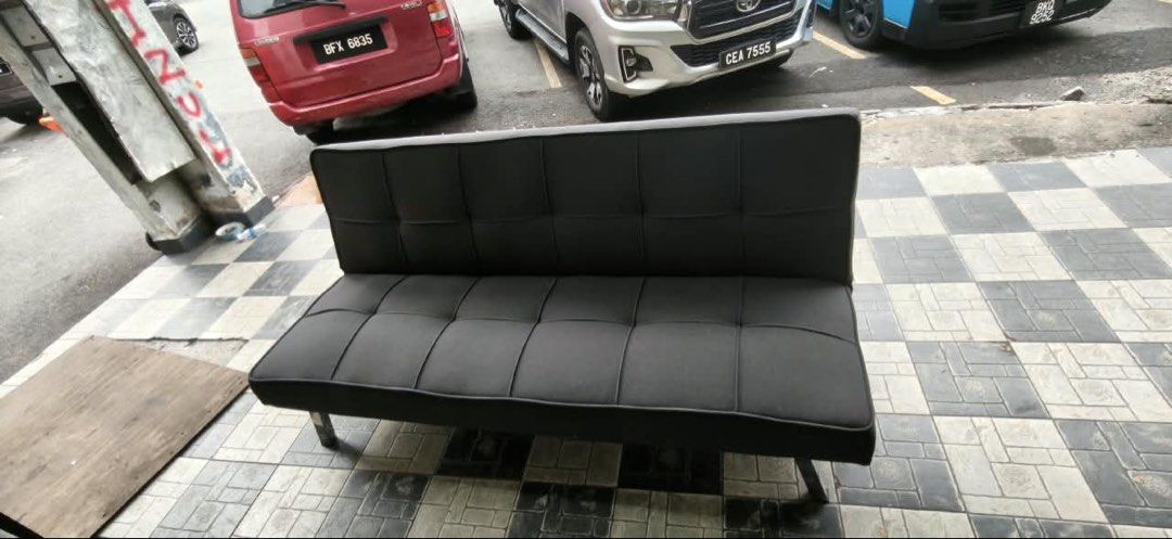 Sofa Bed (Category: Sofas) located in Klang. Submitted by silver_silentphoenix (Listing ID 1469270773, Image 3). Description: ✅ Stylish dark grey design ✅ Converts from sofa to flat bed ✅ Foldable backrest ✅ Comfortable padded seating ✅ Modern design with metal legs ✅ Suitable for small homes, apartments, guest rooms and offices.