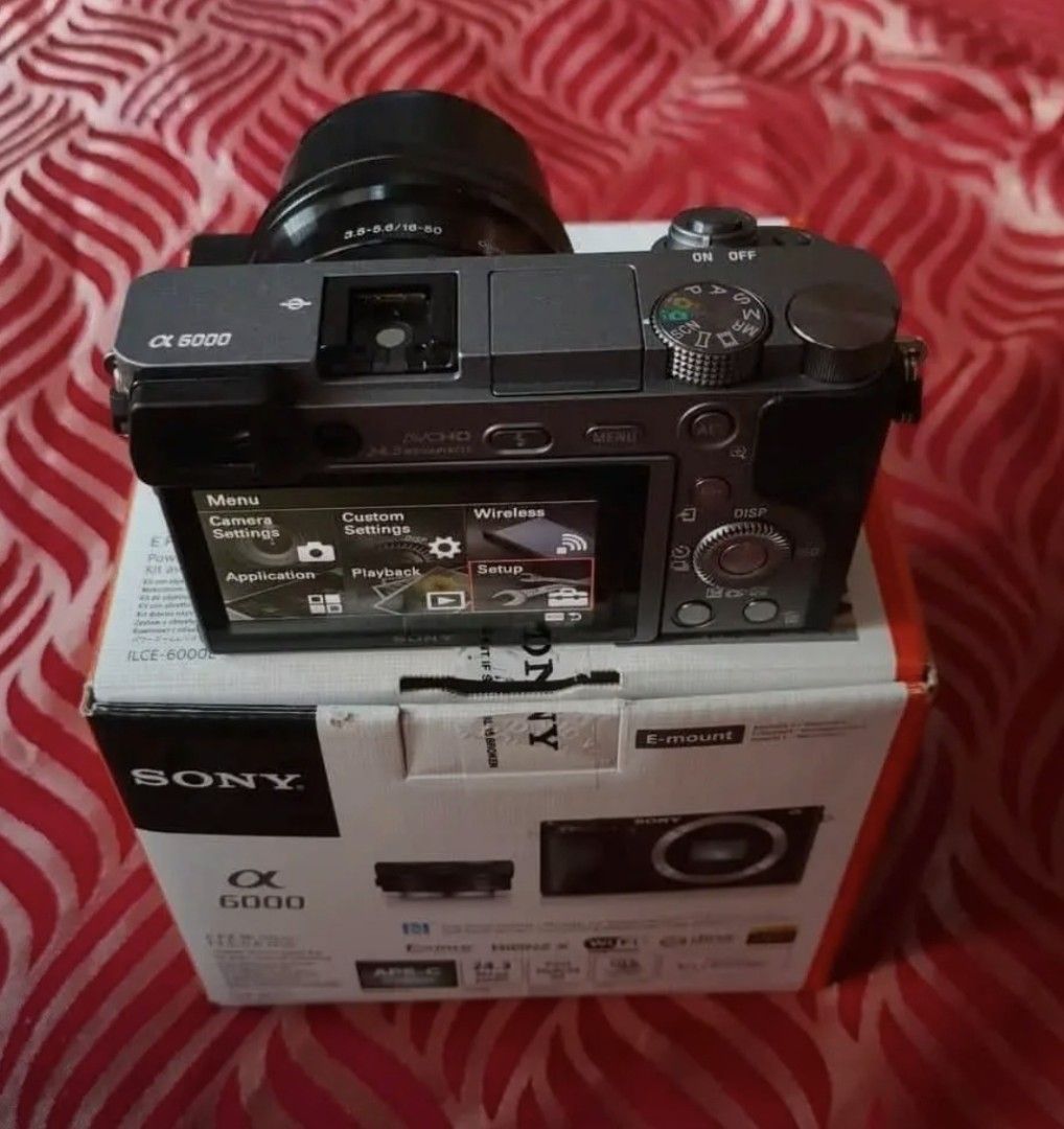 Sony Alpha a6000 Mirrorless Camera with 16-50mm Lens Kit (Category: Cameras) located in Manila. Submitted by oddtiger.2d0471 (Listing ID 1469247294, Image 2). Description: 6Sony A6000 with 16-50mm GUN Metal Silver Edition Complete Box for 15000 only 624mp Hdvideo 60fps WIFI sharing Swovel Lcd Viewfinder MicInput Mirrorless Camera Slightlv Hobbvist used onlv, Perfect Good Condition Complete Box po. Y 98% smoothness Presentable pa po r No defects o