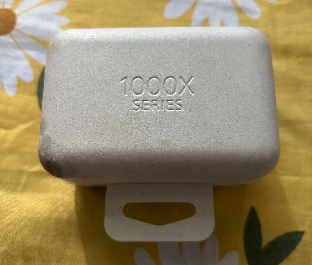 Sony WF-1000XM4 Wireless Earbuds (Category: Headphones & Headsets) located in Bayombong. Submitted by rnstrifty (Listing ID 1469177214, Image 2). Description: Sony WF-1000XM4 wireless noise canceling earbuds in silver/beige colorway. Includes charging case and original paper pulp packaging box. Earbuds sit securely inside the molded case. Battery status indicator lights up green on the front. Fully functional charging case and earphones..