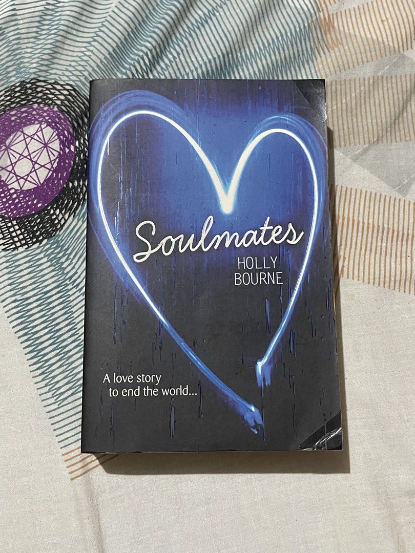 Soulmates by Holly Bourne (Category: Storybooks) located in San Pablo. Submitted by vrmthrsainz (Listing ID 1469192573, Image 1). Description: - Title: Soulmates by Holly Bourne - Format: Paperback - Read once - Condition: with noticeable yellowing, spotting, and cover creases/corner wear - Still readable! - Note: Spine is sturdy and intact, making it a great, readable budget copy for fans.