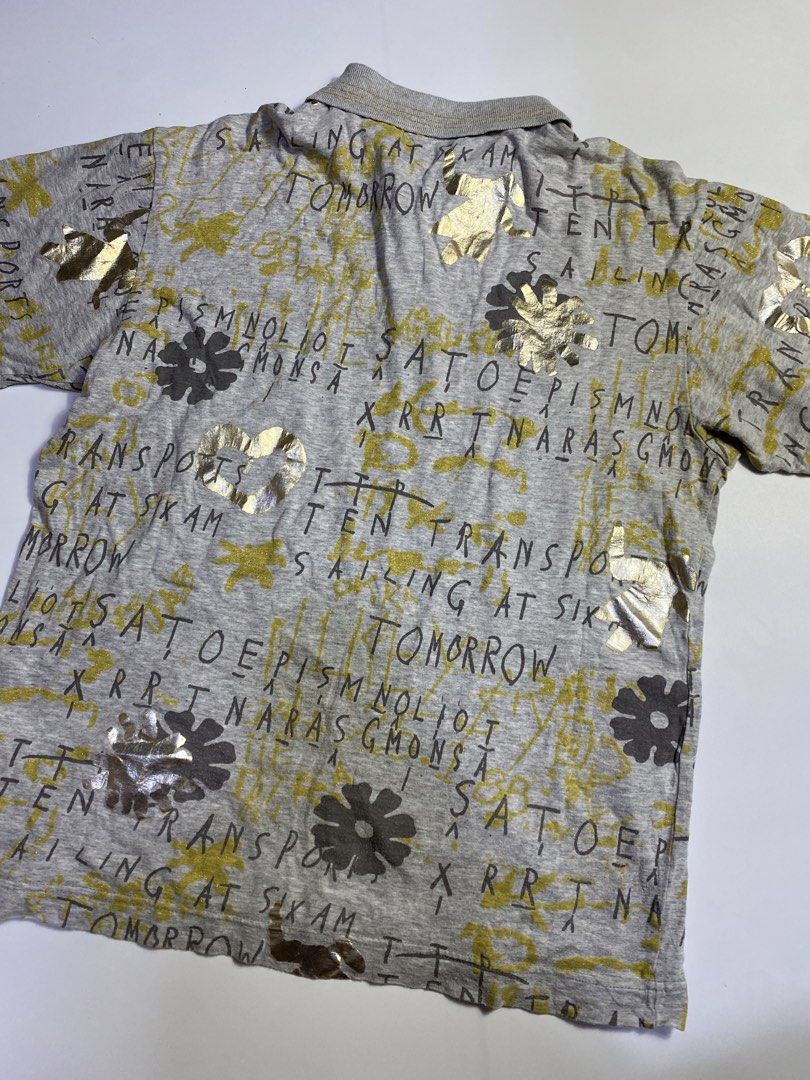 S/S07 CDG Homme Plus “Golden Boy” (Category: Tshirts & Polo Shirts ) located in Manila. Submitted by streetw1se.ph (Listing ID 1469197549, Image 2). Description: S/S07 CDG Plus Size:Medium Width:20 Length:24 Shoulder:18 Sleeve length:7 Hem:21 (Measured in inches) -No major Flaws -Very minimal hairline -100% Cotton.