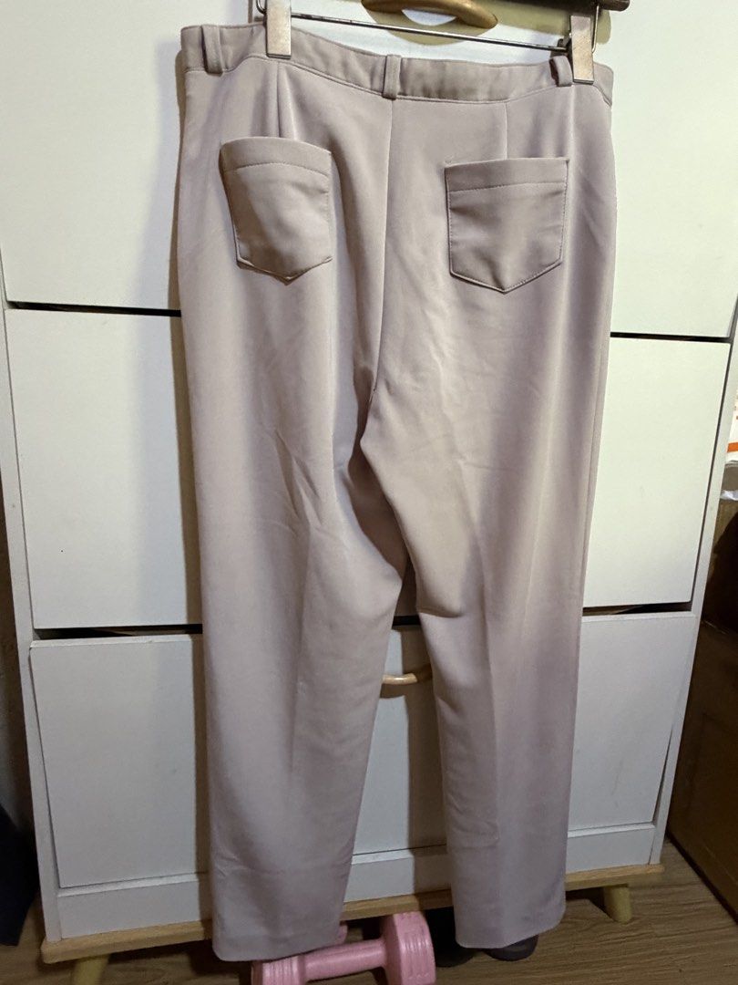 ST Coll Beige Trousers Size 32 (Category: Other Bottoms) located in Siquijor. Submitted by yhostuff (Listing ID 1469180223, Image 3). Description: - Brand: ST Coll - Size: 32 (tag inside) - Color: Classic beige, solid pattern - Details: Structured waistband, belt loops, front zip fly, and button closure - Pockets: Slanted front pockets and back patch pockets - Style: Clean hem lines, perfect for smart casual outfits Waist:30-31” Length: 36”.
