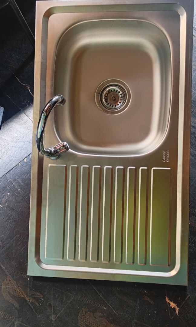 Stainless kitchen sink with drainboard (Category: Home Improvement Tools & Accessories) located in Manila. Submitted by muranglababo_ph2026 (Listing ID 1469201837, Image 3). Description: SULIT PRESYO! STAINLESS KITCHEN SINK – COMPLETE SET 🔥 ✔️ May drainboard ✔️ 17 x 30 inches ✔️ 6 inches deep – hindi talsik ang tubig ✔️ Matibay at madaling linisin ✔️ Complete set na (may fitting at drain at gripo) 💰 ₱1,500 NA LANG! Perfect para sa bahay, apartm