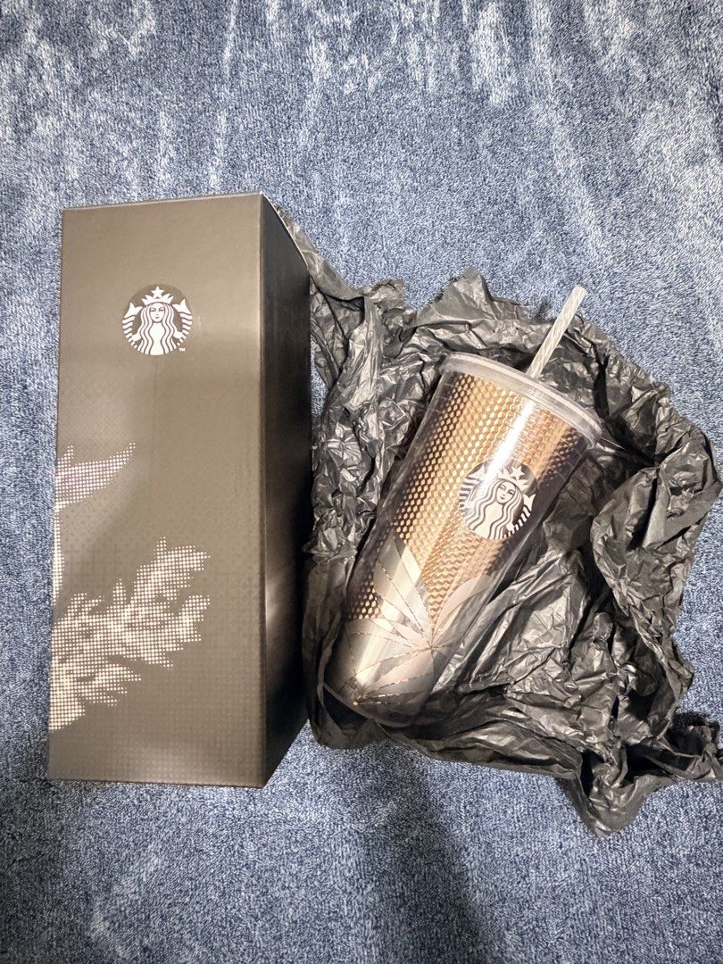Starbucks Studded Cold Cup Tumbler with Box (Category: Water Bottles & Tumblers) located in Cavite. Submitted by mgd.blessed (Listing ID 1469312348, Image 1). Description: - Authentic Starbucks cold cup tumbler - Stunning rose gold gradient finish with textured studded pattern - Includes clear lid, matching straw, and original black branded box with tissue paper - Condition: lightly used, and stored properly - Perfect for collection -I have 2.