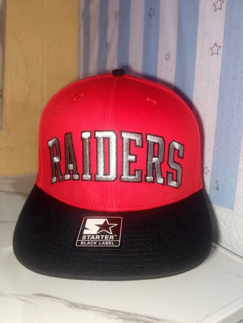 Starter Black Label Las Vegas Raiders Cap (Category: Caps & Hats) located in Manila. Submitted by frenchieal71480 (Listing ID 1469210067, Image 1). Description: - Authentic Starter Black Label Las Vegas Raiders snapback hat - Striking red crown with a sleek black flat brim - Bold silver embroidered Raiders lettering across the front - Classic team shield patch on the side - Adjustable snap closure for a comfortable fit - Original sticker still at