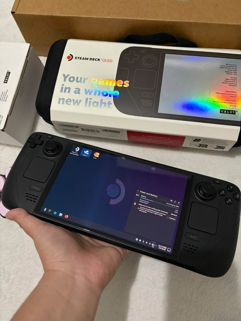 steam deck oled 1tb pre loved (Category: Controllers) located in Caloocan City. Submitted by happyfalcon_e98ee2 (Listing ID 1469195932, Image 3). Description: STEAM DECK OLED 1TB FOR SALE! Your next handheld gaming upgrade is here! Meet the Steam Deck OLED 1TB — perfect for gamers who want to enjoy their favorite PC games on the go! Unit Details: 1TB Storage 100% Battery Health Makinis at maayos na kondisyon Under Warranty Soft copy ng receipt in