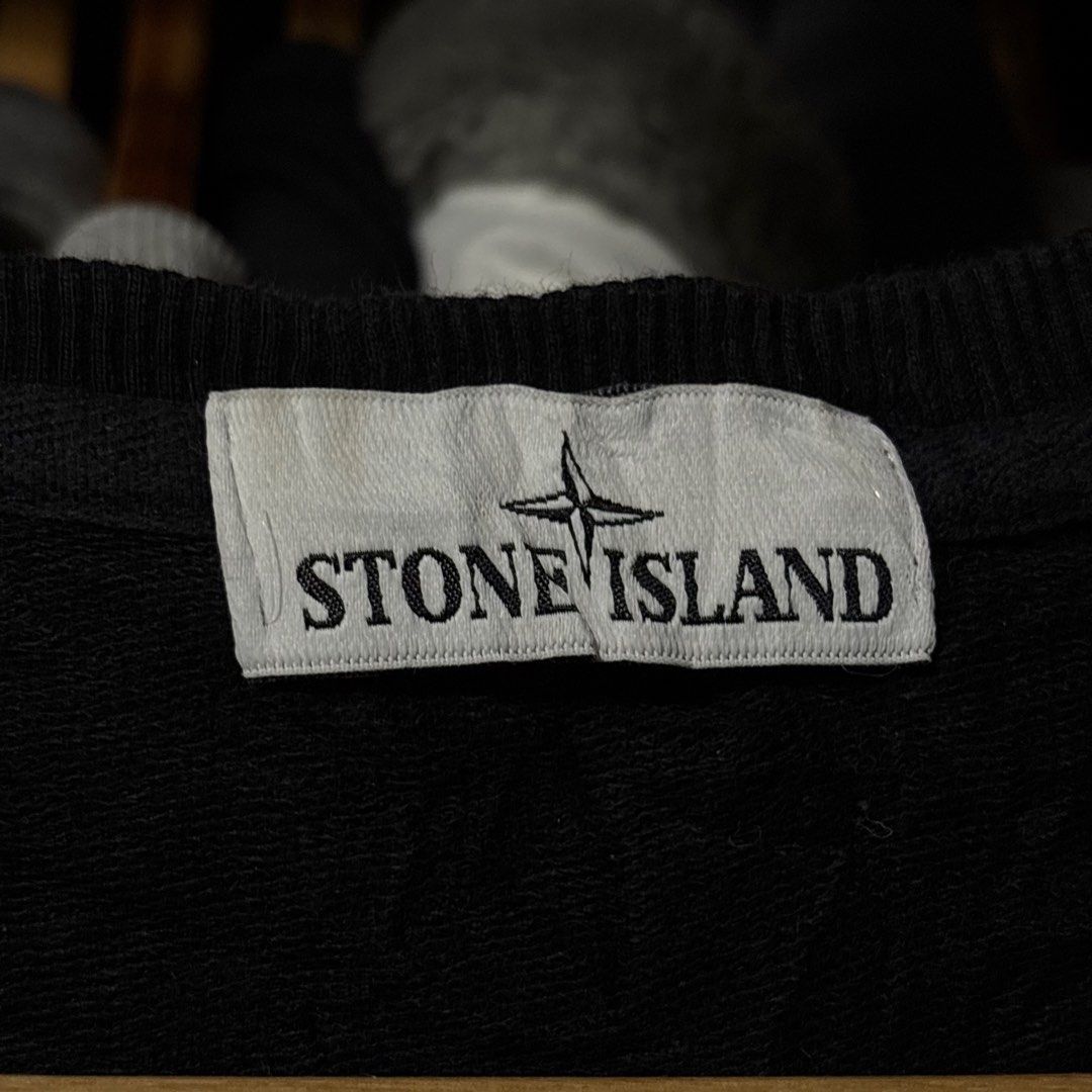 Stone Island Black Sweatshirt (Category: Coats, Jackets and Outerwear) located in Caloocan City. Submitted by bonsatocha43876 (Listing ID 1469322839, Image 3). Description: - Brand: Stone Island - Color: Black - Condition: Very good overall - Details: Classic sleeve compass badge with complete tags attached - Dimensions: Width 24" x Length 28" - Style: Versatile piece, great for daily wear.