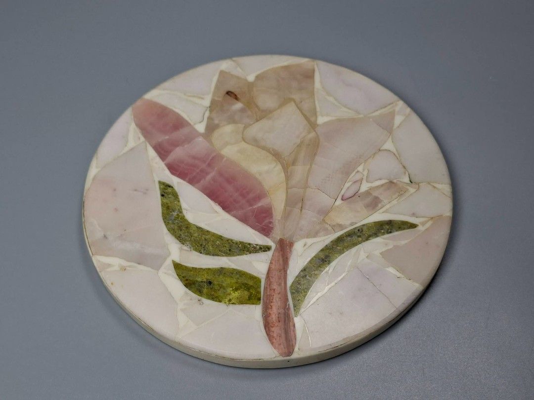 Stone Mosaic Flower Coaster (Category: Dinnerware & Cutlery) located in Paranaque City. Submitted by lexajapansurplus (Listing ID 1469169062, Image 1). Description: - Elegant round stone coaster with a handcrafted flower inlay design - Features a charming mix of pink, green, and white natural stone - Smooth, polished surface with flat, clean edges - Thick base provides sturdy support for cups, mugs, or small potted plants - Unique natural stone v