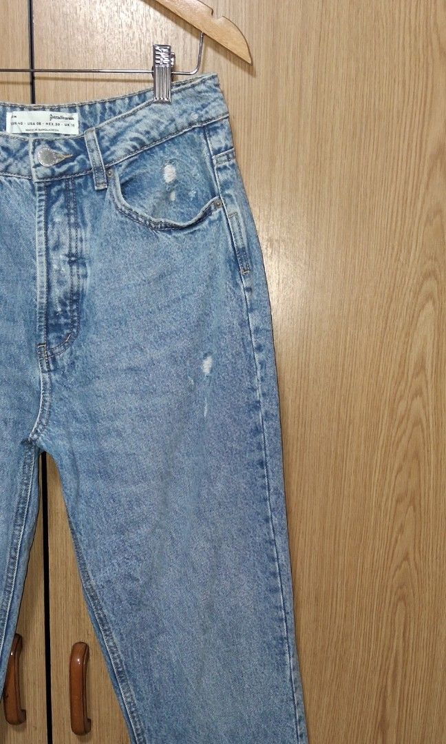 Stradivarous Mom Jeans (Category: Jeans) located in Cebu City. Submitted by cebuanamomshies (Listing ID 1469322364, Image 3). Description: W30-31 Rise 12 inseam 28.5 High-rise Button fly blue denim Tapered relaxed fit.