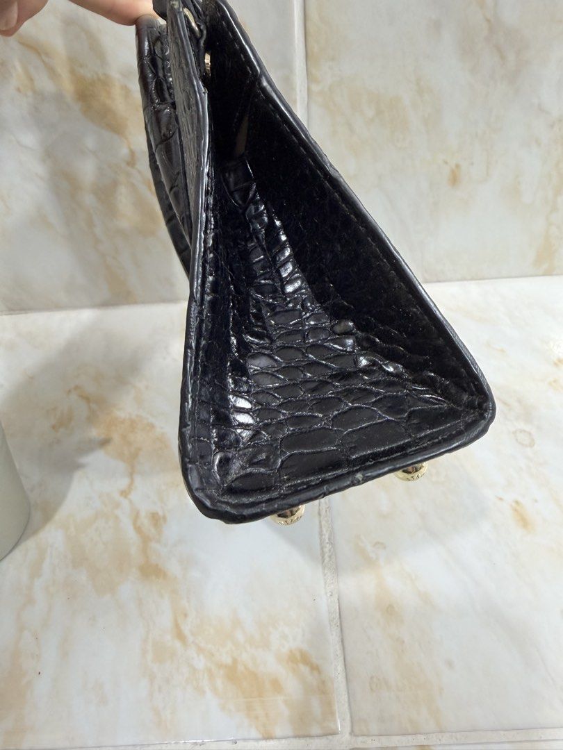 Strathberry Black Croc Embossed Mini Tote Bag (Category: Tote Bags) located in Manila. Submitted by haveago0dthrift (Listing ID 1469257290, Image 2). Description: - Brand: Strathberry - Color: Classic Black - Material: Crocodile-embossed leather with gold-tone hardware - Features: Signature top bar, protective metal feet, structured self-standing design, and clean exterior leather - Condition: Noticeable wear and peeling on the leather handles (p