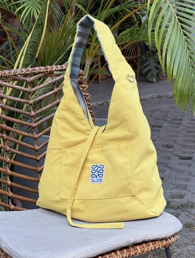 Straw Origami bag by @by___timmy (Category: Tote Bags) located in Manila. Submitted by o813th (Listing ID 1469201079, Image 2). Description: - Alon from Exclusive Summer Collection (already phased out) - outer material: straw textile - inner material: canvas - tie closure - bought for 1.5k (used twice only) - can fit 14" laptop or ipad and very spacious.