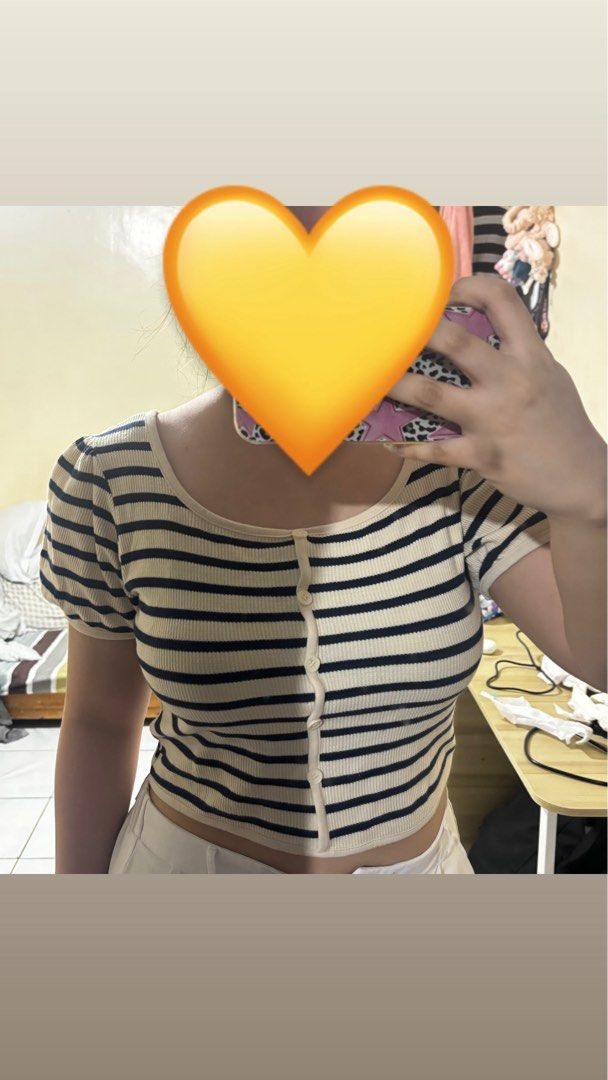 Striped Ribbed Crop Top with Puff Sleeves (Category: Shirts) located in Magalang. Submitted by mvenetri (Listing ID 1469321302, Image 1). Description: Striped Ribbed Crop Top with Puff Sleeves - Fits small to semi-med girlies - Navy blue and white in person (colour may vary due to lighting) - Like new, used only a few times.