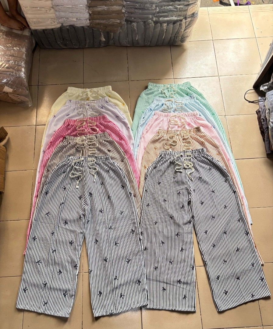 Striped Wide Leg Lounge Pants with Drawstring (Category: Jeans) located in Manila. Submitted by frenchieal71480 (Listing ID 1469204395, Image 2). Description: - Cute striped lounge pants with adorable ribbon print - Elastic waistband with adjustable drawstring tie for maximum comfort - Relaxed wide-leg cut, perfect for home wear or casual out-of-house styling - Available in multiple colors - Brand new and super soft fabric - Send a message to che