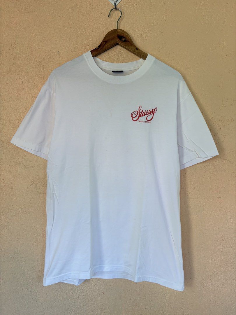 Stüssy 80 Laguna Graphic Tee White Size L (Category: Tshirts & Polo Shirts ) located in Pozorrubio. Submitted by zionegotthrift (Listing ID 1469200664, Image 1). Description: - Brand: Stüssy - Color: White - Size: Large - Material: 100% Cotton (Made in Mexico) - Design: Small script logo on left chest, big liquid bubble '80 Laguna' graphic on the back - Fit: Standard crew neck short sleeve.
