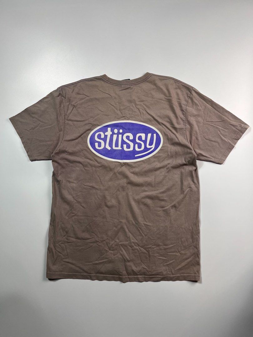 Stussy Oval Logo Tee Brown (Category: Tshirts & Polo Shirts ) located in Iloilo. Submitted by lowesdrift (Listing ID 1469208093, Image 2). Description: - Brand: Stussy - Color: Brown with a washed-out vintage tone - Size: L (Made in Honduras) - Design: Large oval logo printed on the back - Fit/Style: Crew neck with short sleeves - Material: Comfortable cotton fabric.