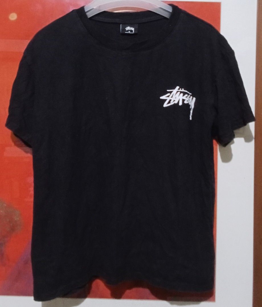 Stussy World Chapter Black T-Shirt Medium (Category: Tshirts & Polo Shirts ) located in Manila. Submitted by okellorrai95403 (Listing ID 1469285069, Image 2). Description: - Brand: Stussy - Color: Black - Size: Medium (Made in Mexico) - Material: 100% Cotton - Design: Small front logo with large graphic text print on the back - Measurements: 21" width x 24" length - Condition: Excellent, well-maintained.