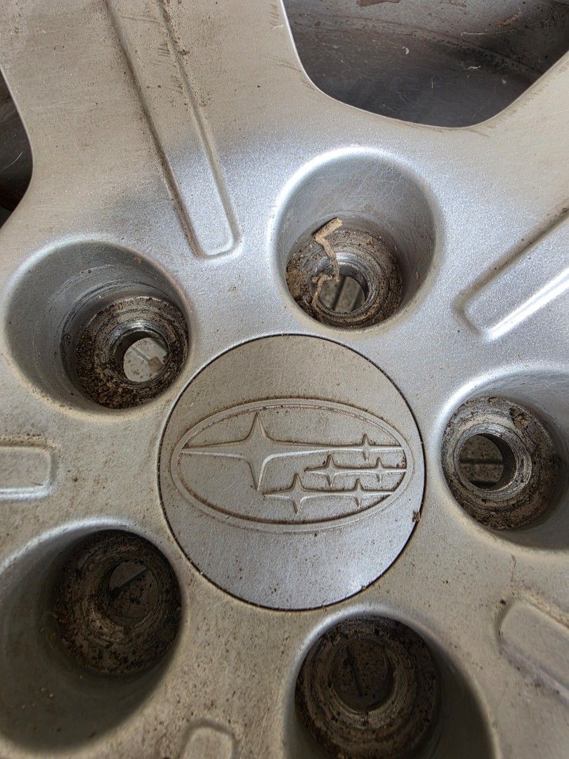 Subaru Stock Mags (Category: Mags and Tires) located in Valenzuela. Submitted by brightshark_c31a69 (Listing ID 1469192675, Image 3). Description: - Authentic Subaru stock mags (Set of 4) - Classic silver finish with multi-spoke design - Included center caps with Subaru logo - Shows normal signs of previous use and cosmetic wear; solid and sturdy build - Ideal replacement or spare set - Pickup near Malanday Valenzuela.