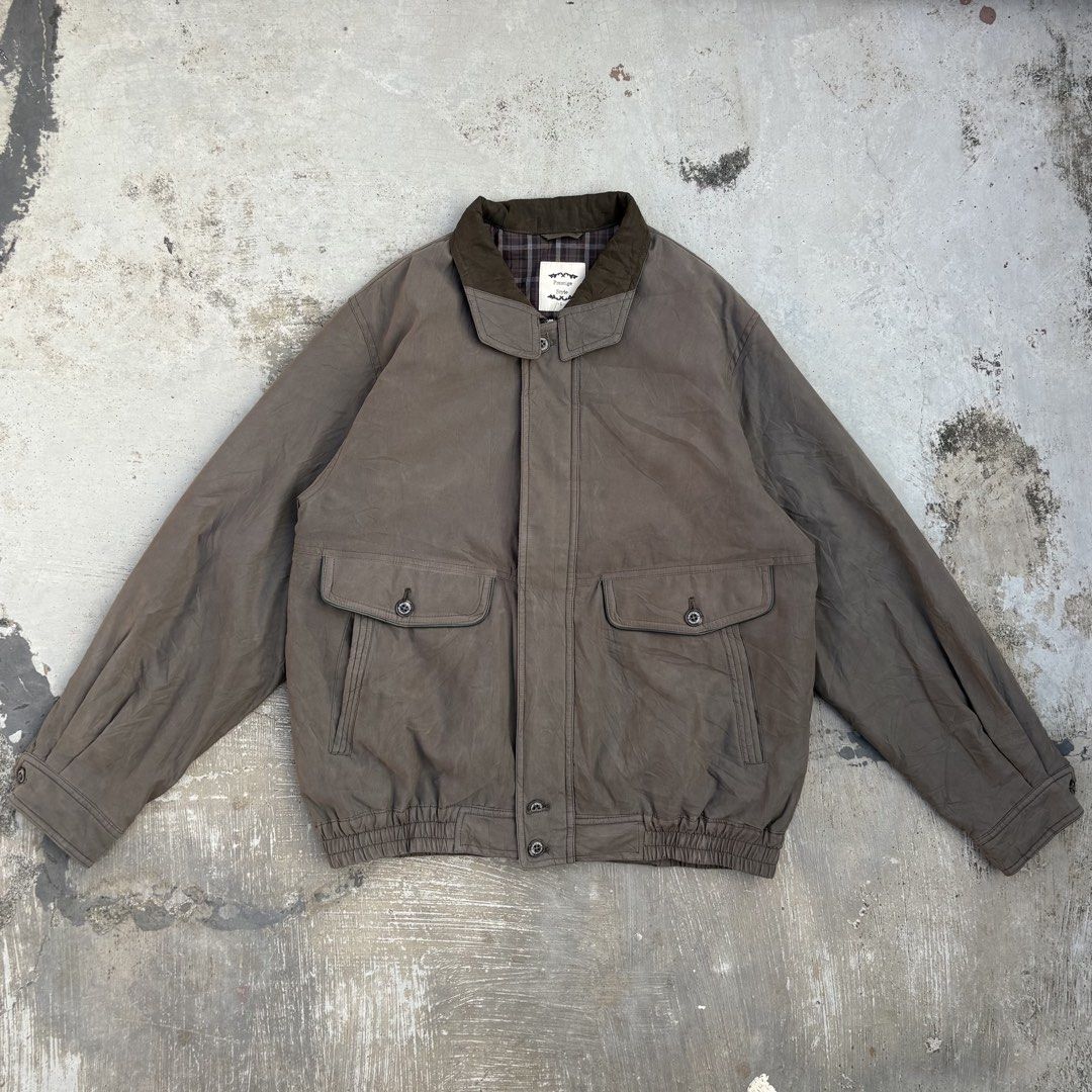 Suede Collar Vintage Harrington Workwear Jacket (Category: Coats, Jackets and Outerwear) located in Calamba. Submitted by lyrons.wardrobe (Listing ID 1469258101, Image 1). Description: Dimes: 23x25 olive-green utility or flight bomber jacket featuring an olive-toned contrasting collar, dual button-flap chest pockets, vertical hand pockets, and a ribbed elastic hem..