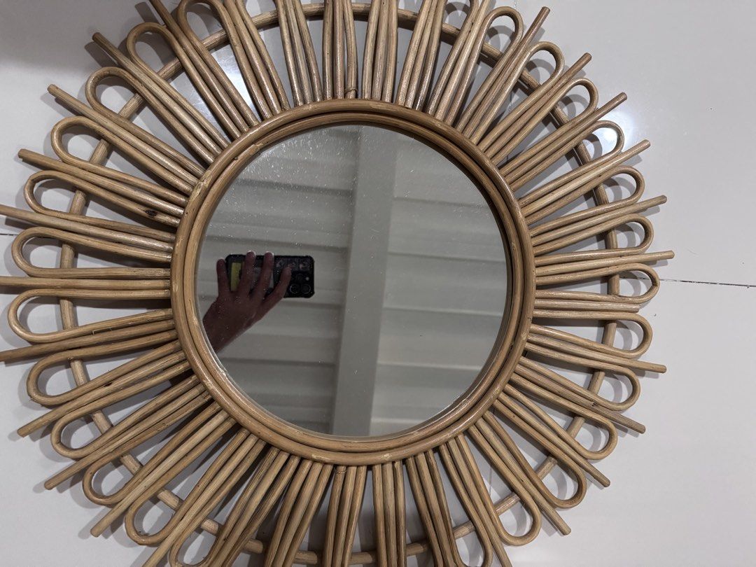 Sunburst Rattan Wall Mirror Boho Decor (Category: Mirrors) located in Taguig. Submitted by xervin (Listing ID 1469267395, Image 2). Description: - Material: Natural rattan frame with sturdy wooden backing - Design: Sunburst/daisy style with looped cane rays - Ready to hang: Includes a built-in hanging cord - Lightweight: Easy to mount in any room - Aesthetic: Neutral wood tone ideal for boho, minimalist, or rustic spaces - mirror only diameter - 