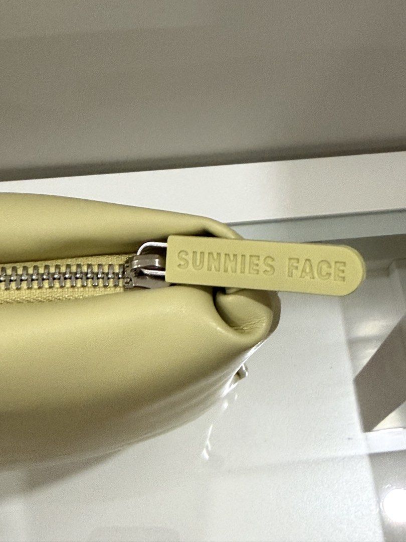 Sunnies Face Pillow Pouch (Category: Purses & Pouches) located in Manila. Submitted by sheisdecluttering (Listing ID 1469379173, Image 2). Description: NEVER USED 10/10 CONDITION color: Pastillas.