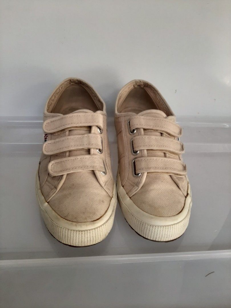 Superga Triple Velcro Canvas Sneakers Beige (Category: Sneakers) located in Paranaque City. Submitted by jonasgonas (Listing ID 1469190836, Image 1). Description: - Brand: Superga - Color: Neutral beige - Closure: 3 convenient velcro straps - Details: Textured rubber toe cap, thick rubber sole with heel logo - Condition: Signs of wear on fabric and soles from regular use - Style: Casual, easy slip-on sneakers.