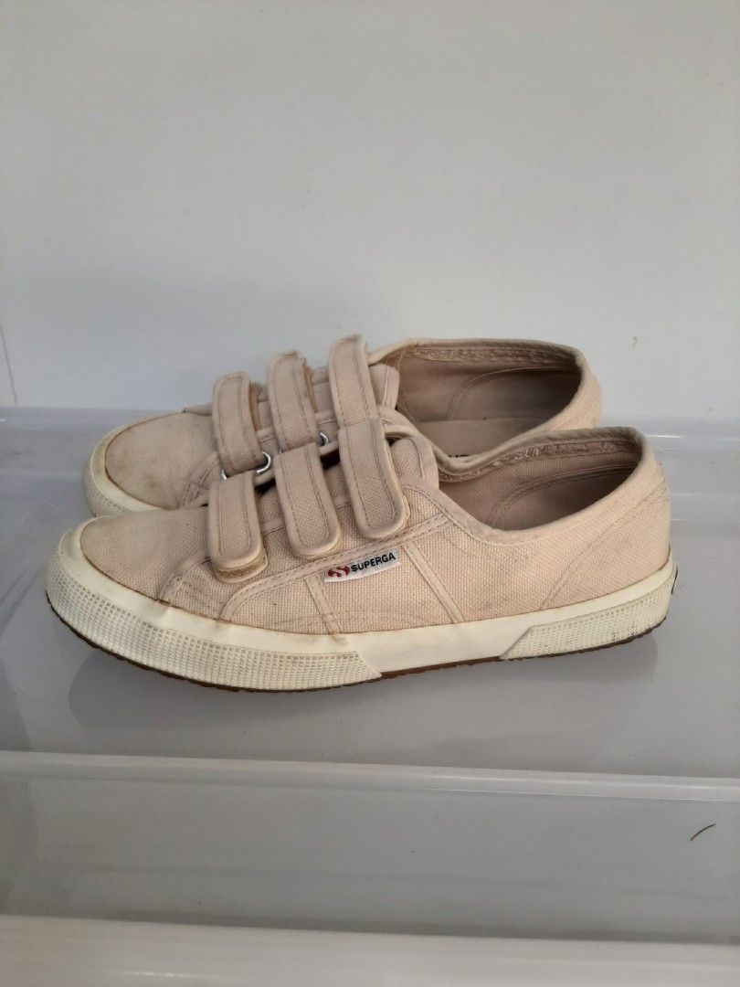 Superga Triple Velcro Canvas Sneakers Beige (Category: Sneakers) located in Paranaque City. Submitted by jonasgonas (Listing ID 1469190836, Image 3). Description: - Brand: Superga - Color: Neutral beige - Closure: 3 convenient velcro straps - Details: Textured rubber toe cap, thick rubber sole with heel logo - Condition: Signs of wear on fabric and soles from regular use - Style: Casual, easy slip-on sneakers.