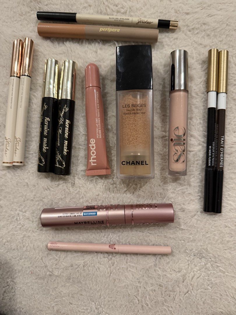 TAKE ALL! (Category: Makeup) located in Manila. Submitted by nini_archives (Listing ID 1469252770, Image 1). Description: Chanel Les beiges (lightest shade) 80% Said concealer (pinkish shade) 95% Hermes eye pencils brown and black (90%) Kissme heroine black and brown mascara (75%) Strokes eyeliner (80%) sky high mascara (95%) Vice lip liner (40%) Peripera contour stick (75%) Strokes black eyeliner (70%).