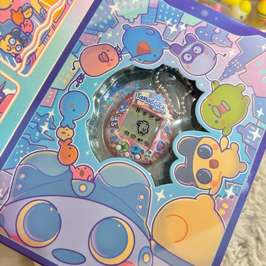 Tamagotchi Mame Robot (Category: Interactive Toys) located in Marikina City. Submitted by majo-esguerra (Listing ID 1469179483, Image 2). Description: Selling it less than what I paid for. I've already installed a screen protector and remove the battery for safe storage. .