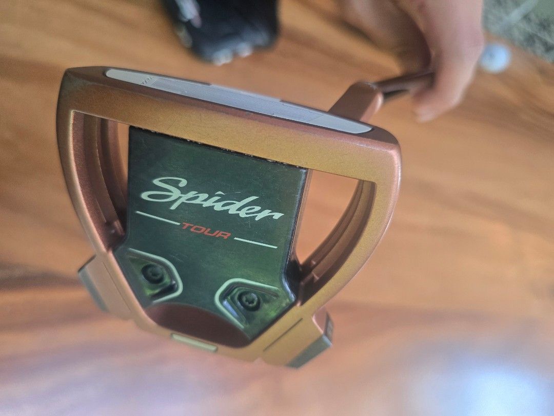 TaylorMade Spider Tour Copper Putter Golf Pride Grip (Category: Golf) located in San Juan City. Submitted by grandelyon (Listing ID 1469208902, Image 1). Description: Open for trade - Model: TaylorMade Spider Tour Putter (Copper Finish) - Face: Pure Roll insert for a smooth, clean roll - Shaft: Upgraded KBS CT Tour putter shaft - Grip: Upgraded Golf Pride Reverse Taper grip - Condition: Normal minor scuffs from regular play, solid player's condit