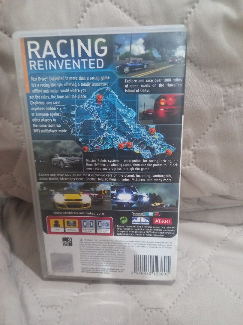 Test Drive Unlimited PSP Game (Category: PlayStation) located in Valenzuela. Submitted by retro.rush (Listing ID 1469310504, Image 2). Description: - Title: Test Drive Unlimited for PlayStation Portable (PSP) - Gameplay: Open-world racing set on the Hawaiian island of Oahu - Cars: Over 65 licensed vehicles including Lamborghini, Aston Martin, and Mercedes-Benz - Features: Master the points system for high-speed racing and drifting - Condition: Bo