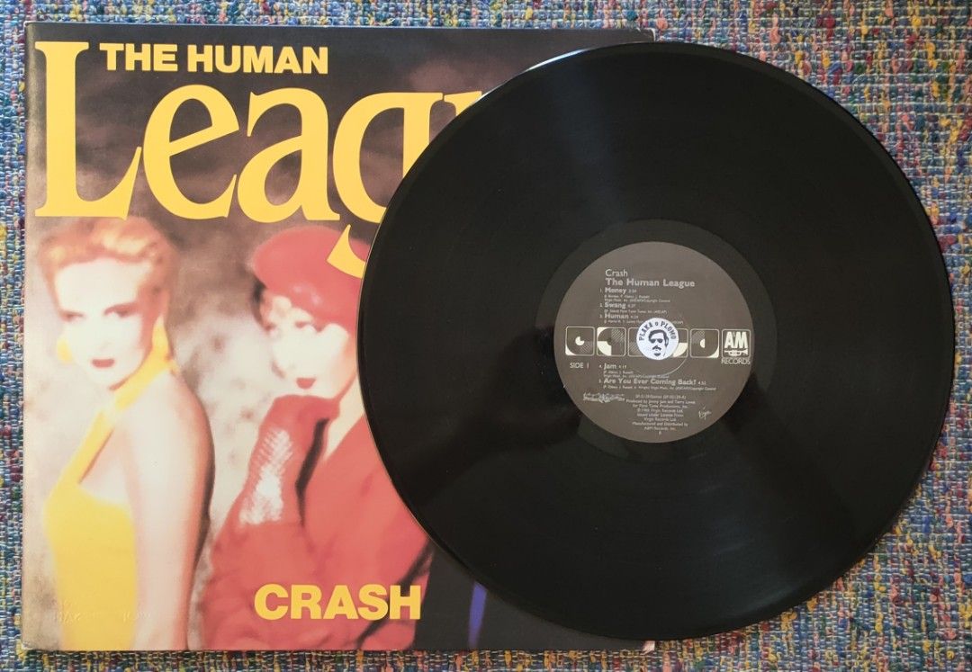 The Human League - Crash LP Vinyl Record (Category: Vinyls) located in Quezon City. Submitted by plaka.o.plomo (Listing ID 1469231654, Image 3). Description: Artist(s) : The Human League Album : Crash Year : 1986 Media : VG+ Color : Black Sleeve : VG+ No. : 1x Vinyl Size : 12" RPM : 33 Country : US Catalog No. : SP-5129 Tracklist : - Side 1 1. Money 3:54 2. Swang 4:37 3. Human 4:24 4. Jam 4:19 5. Are You Ever Coming Back? 4:52 - Side 2 1. I Need 