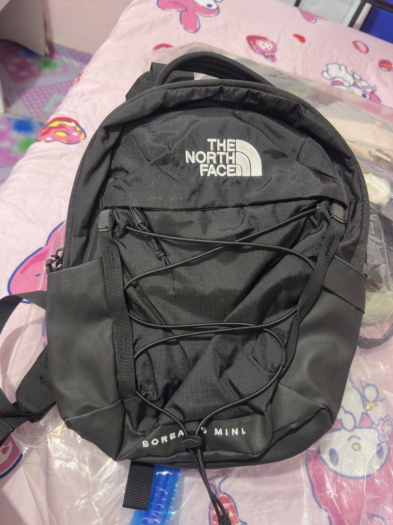 The North Face Borealis Mini Backpack (Category: Backpacks) located in Quezon City. Submitted by the1997inc (Listing ID 1469178551, Image 1). Description: - Authentic The North Face Borealis Mini Backpack in sleek black - Signature front bungee cord system and embroidered logo - Comfortable padded shoulder straps with reflective details - Convenient sturdy top handle and side zip pocket - Perfect compact size for daily essentials and errands - Ha