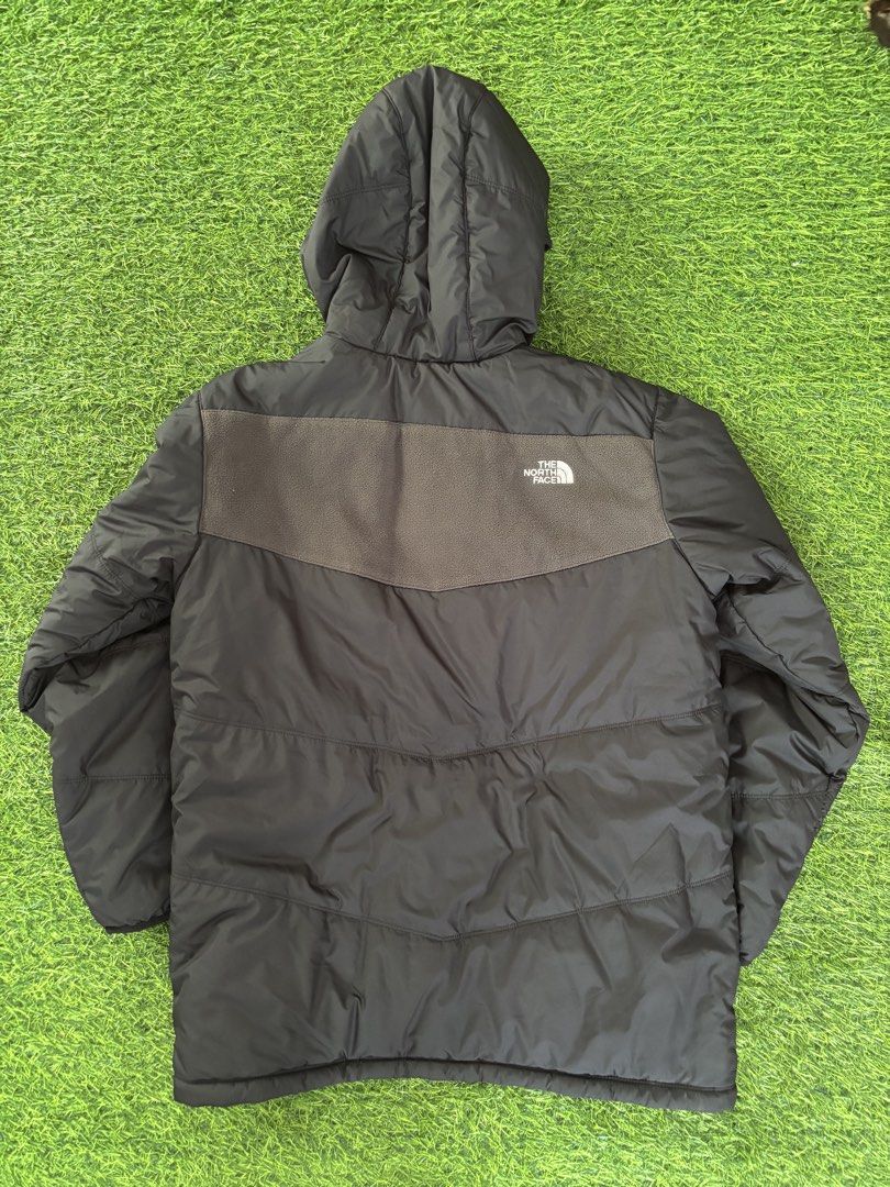 The North Face Reversible Puffer Jacket (Category: Coats, Jackets and Outerwear) located in Makati City. Submitted by rare_thrift_stuff (Listing ID 1469164787, Image 2). Description: - Brand: The North Face - Style: Reversible Jacket (Black puffer/grey fleece on one side, full grey fleece with black panel on the other) - Features: Attached hood, full zip closure with YKK hardware, embroidered white logos on both sides - Fit: Standard fit - Condit