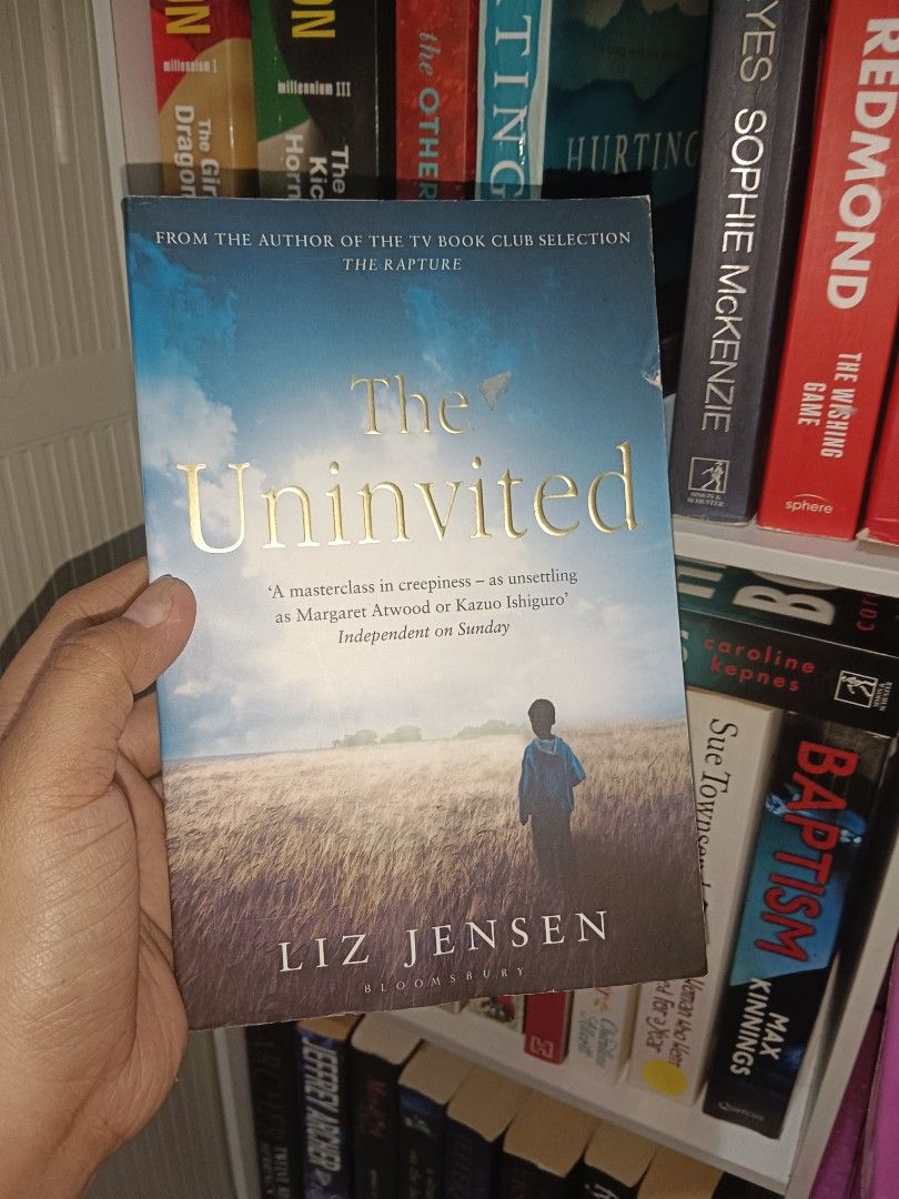 The Uninvited by Liz Jensen Paperback Novel (Category: Storybooks) located in Manila. Submitted by rosareads (Listing ID 1469257573, Image 1). Description: - Title: The Uninvited by Liz Jensen - Publisher: Bloomsbury - Genre: Thriller / Suspense / Mystery - Format: Paperback - Condition: Cover has slight edge wear from reading/storage; pages are clean, complete, and intact - Perfect for fans of page-turning thriller fiction!.