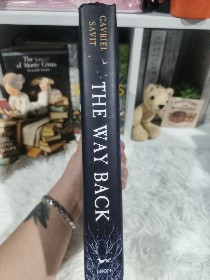 The Way Back by Gavriel Savit Hardcover (Category: Storybooks) located in Cabuyao City. Submitted by chaptersandwonders143 (Listing ID 1469314245, Image 3). Description: - Title & Author: The Way Back by Gavriel Savit - Publisher: Knopf - Format: Hardcover with dust jacket - Special Feature: National Book Award Finalist badge on dust jacket - Aesthetics: Dark blue cloth boards with elegant gold foil lettering on the spine - Condition: Clean pages