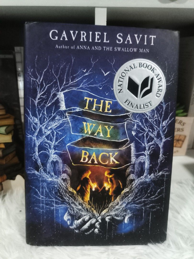 The Way Back by Gavriel Savit Hardcover (Category: Storybooks) located in Cabuyao City. Submitted by chaptersandwonders143 (Listing ID 1469314245, Image 1). Description: - Title & Author: The Way Back by Gavriel Savit - Publisher: Knopf - Format: Hardcover with dust jacket - Special Feature: National Book Award Finalist badge on dust jacket - Aesthetics: Dark blue cloth boards with elegant gold foil lettering on the spine - Condition: Clean pages