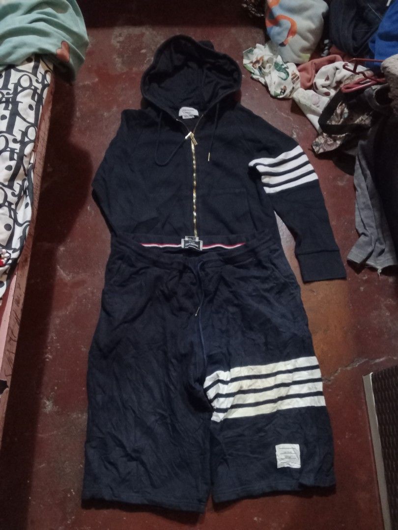 Thom Browne (Category: Hoodies) located in Manila. Submitted by tcbukay_zxc25 (Listing ID 1469337510, Image 1). Description: Thom Browne hoodie size 2 good condition issue minimal stain Thom Browne short size 5 issue stain.