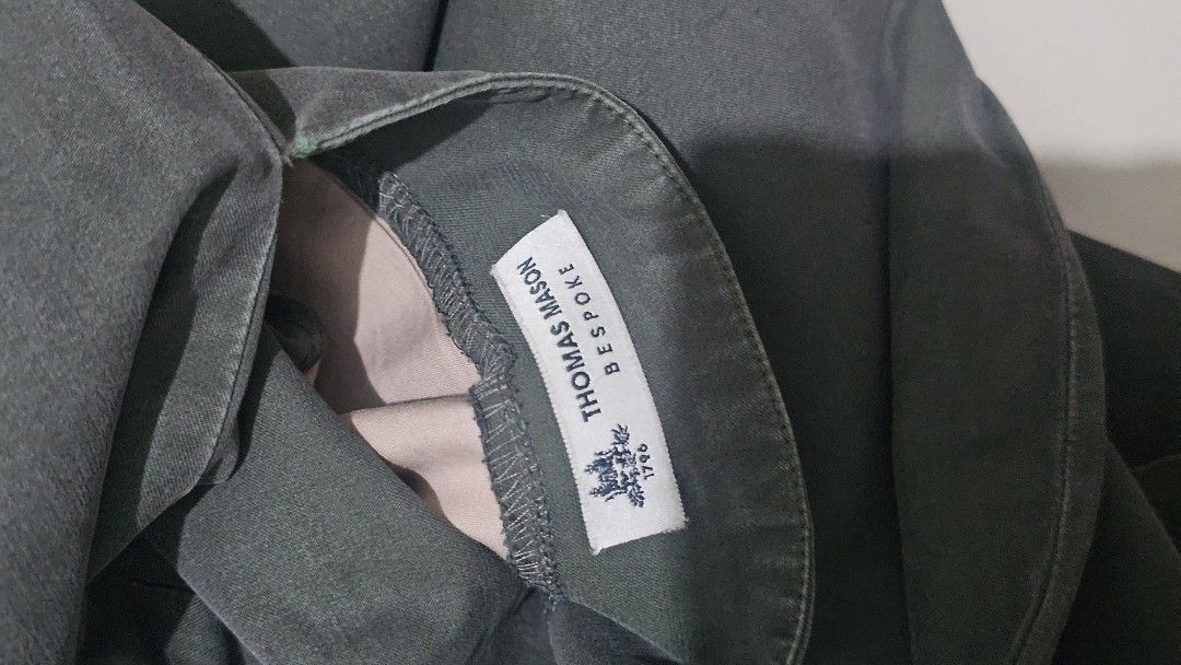 Thomas Mason Bespoke Green Trousers (Category: Trousers) located in Manila. Submitted by babie143 (Listing ID 1469314871, Image 2). Description: - Brand: Thomas Mason Bespoke - Color: Dark green (neutral shade, easy to match) - Fit: Classic straight leg, comfortable fit - Details: Button closure with zip fly, side elastic waistband - Fabric: Sturdy and durable - Style: Casual or smart casual.