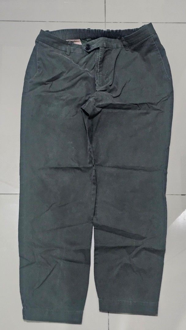 Thomas Mason Bespoke Green Trousers (Category: Trousers) located in Manila. Submitted by babie143 (Listing ID 1469314871, Image 1). Description: - Brand: Thomas Mason Bespoke - Color: Dark green (neutral shade, easy to match) - Fit: Classic straight leg, comfortable fit - Details: Button closure with zip fly, side elastic waistband - Fabric: Sturdy and durable - Style: Casual or smart casual.