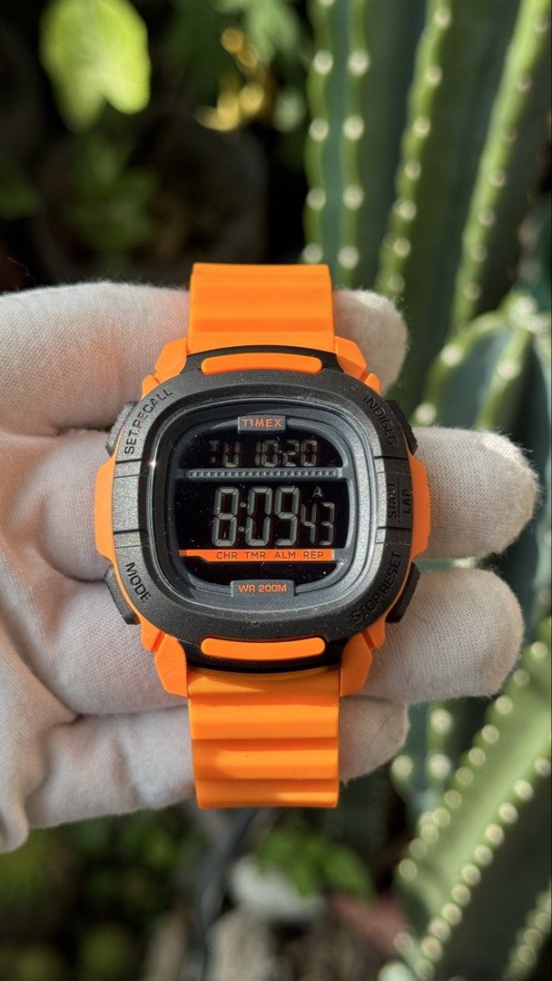 Timex Shock Resistant Digital Watch Orange TW5M26500 (Category: Men's Watches) located in Manila. Submitted by junjun12356 (Listing ID 1469163552, Image 1). Description: - Brand: Timex - Model: TW5M26500 - Color: Bright orange with black accents - Functions: Digital display, stopwatch, timer, alarm - Build: Durable resin strap and stainless steel back - Water Resistance: Up to 200 meters - Condition: Clean, tested, and working properly.