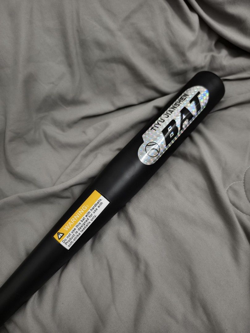 Tiyu Jianshen Black Teeball Bat (Category: Racket and Ball Sports) located in Angeles City. Submitted by measaliman02351 (Listing ID 1469167175, Image 2). Description: - Brand: Tiyu Jianshen - Color: Sleek matte black with a shiny silver holographic logo - Material: Lightweight plastic/foam construction, ideal for kids - Safety: Includes official warning sticker for soft-strike teeballs only - Perfect for youth t-ball practice and fun play.