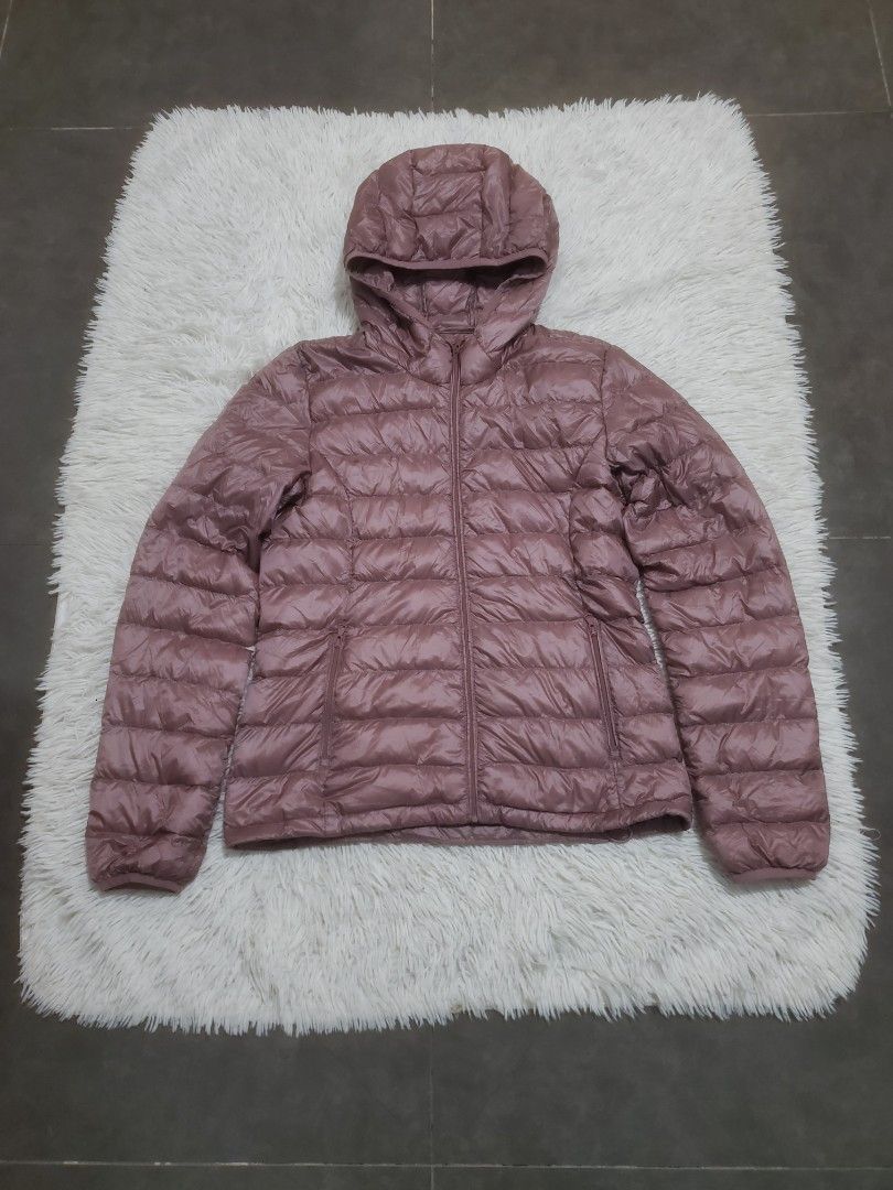 Tna Botanie Packable Down Puffer Jacket (Category: Coats, Jackets and Outerwear) located in Manila. Submitted by royalrabbit.7b2a11 (Listing ID 1469197174, Image 2). Description: - Brand/Model: Tna Botanie Down Puffer Jacket - Color: Mauve Pink - Size: Small (S) - Condition: Excellent - Warmth: Responsible Down Standard (RDS) certified filling for lightweight warmth - Features: Packable design, attached hood, full zip closure - Perfect for: Chill
