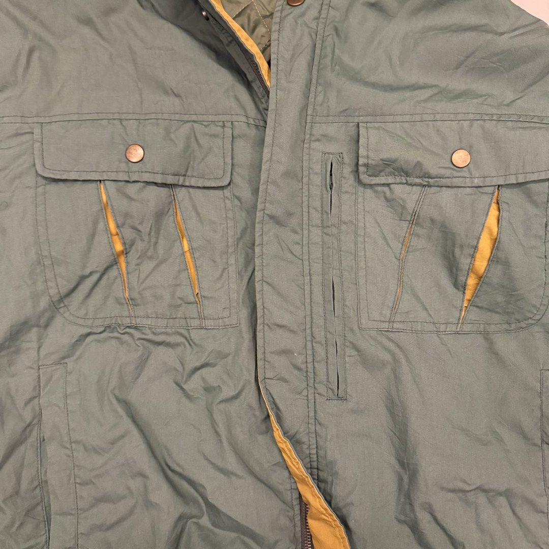TOKYU Green Vintage Winter Jacket Size L (Category: Coats, Jackets and Outerwear) located in Paranaque City. Submitted by joeymon1 (Listing ID 1469280526, Image 3). Description: Rfs: not my style anymore - Brand: TOKYU - Size: Large - Color: Green with mustard yellow inner placket - Lining: Quilted for extra warmth - Pockets: Multiple front button-flap pockets and vertical chest zipper pockets .