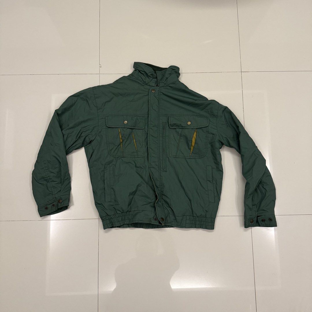 TOKYU Green Vintage Winter Jacket Size L (Category: Coats, Jackets and Outerwear) located in Paranaque City. Submitted by joeymon1 (Listing ID 1469280526, Image 1). Description: Rfs: not my style anymore - Brand: TOKYU - Size: Large - Color: Green with mustard yellow inner placket - Lining: Quilted for extra warmth - Pockets: Multiple front button-flap pockets and vertical chest zipper pockets .