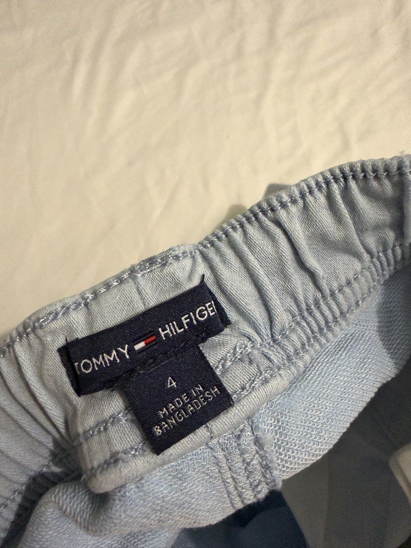 Tommy Hilfiger Light Blue Jogger Pants Size 4 (Category: Babies & Kids Fashion) located in Quezon City. Submitted by ememsantos (Listing ID 1469215375, Image 2). Description: - Brand: Tommy Hilfiger - Color: Light blue - Size: 4 (Kids) - Material: Comfortable cotton - Features: Elastic waistband with red, white, and black striped drawstring, cuffed ankles, and front pockets - Style: Easy pull-on jogger pants - Origin: Made in Bangladesh.