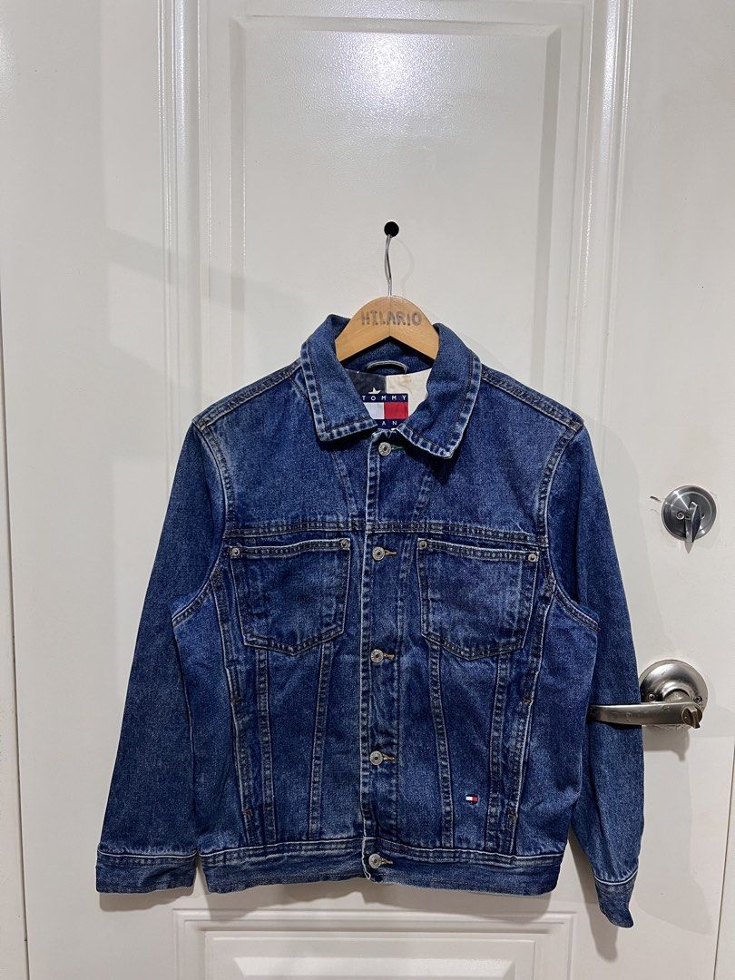 Tommy Jeans Denim Jacket with Back logo (Category: Coats, Jackets and Outerwear) located in San Pedro. Submitted by _eyamarieii (Listing ID 1469353527, Image 1). Description: Tommy Hilfiger Jeans Denim Jacket Excellent condition Color rate 9.5/10 No issue Need wash only Size XS ontag Width 19.5 Length 24 1500+sf.