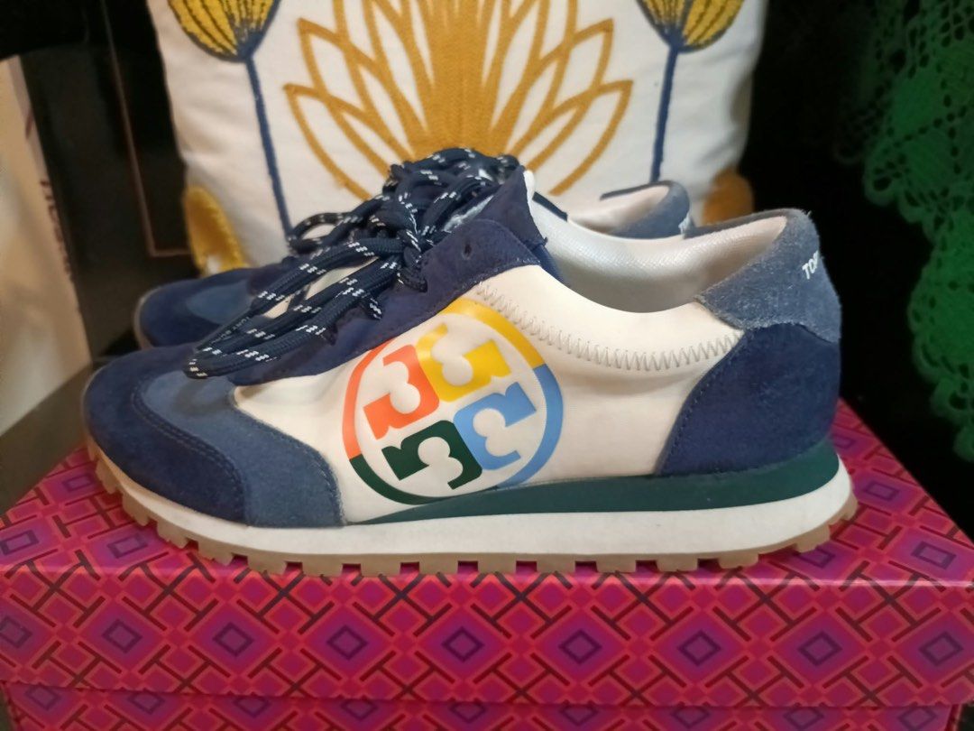 Tory Burch Colorblock Good Luck Trainer Sneakers (Category: Sneakers) located in Ozamiz City. Submitted by Maney8 (Listing ID 1469290315, Image 1). Description: - Brand: Tory Burch - Model: Good Luck Trainers - Colorway: Blue, white, and multi-color - Materials: Suede and nylon upper with durable rubber sole - Design details: Signature circular T logo, contrast dark laces, and branded heel counter - Sole: Chunky patterned rubber for extra grip an