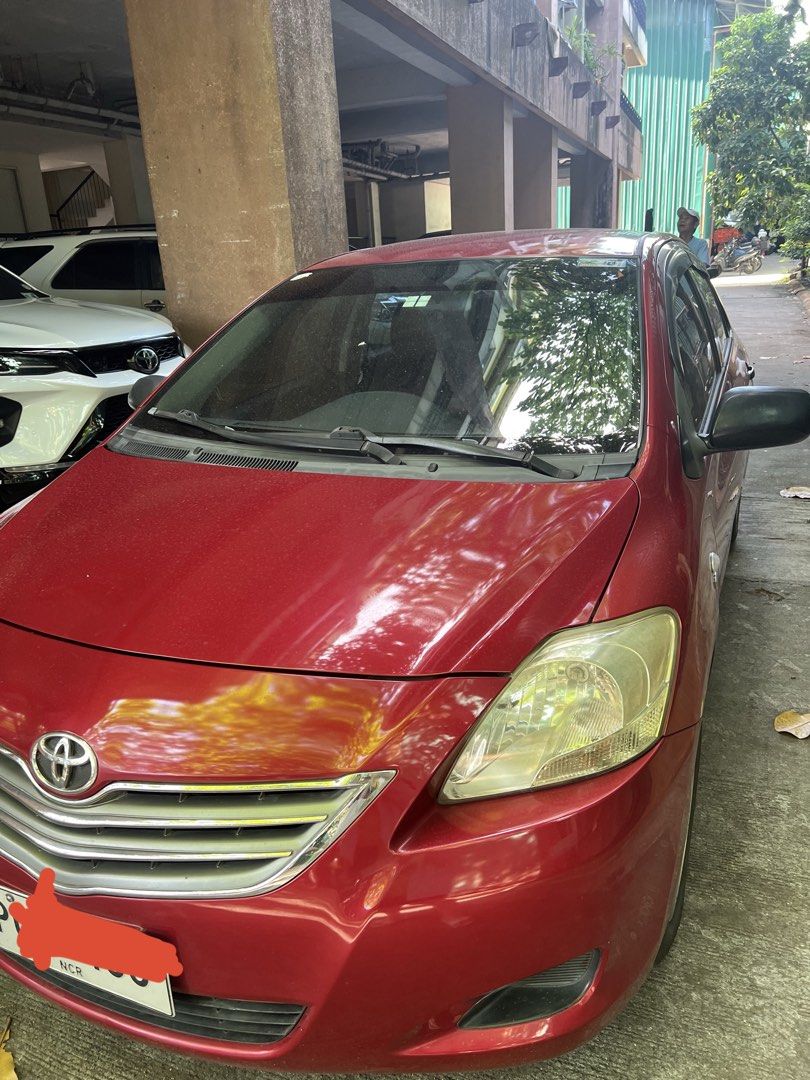 Toyota Vios 1.3 J Manual (Category: Used Cars) located in Paranaque City. Submitted by yahmny (Listing ID 1469174985, Image 1). Description: 🚗 FOR SALE: 2011 TOYOTA VIOS 1.3 J ✨ Reliable, fuel-efficient, and budget-friendly car! 📌 Details: * Model: Toyota Vios 1.3 J * Year: 2011 * Mileage: 115,000 km * Transmission: [Manual] * Fuel Type: Gasoline * Color: Metallic Red * first owner * Price: ₱200,000 ✅ Ideal for daily use ✅ Fuel-efficient and pr